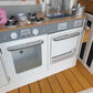 Indoor Large White Wooden Kitchen with Fridge