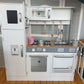Indoor Large White Wooden Kitchen with Fridge